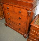 A Victorian mahogany chest of drawers, probably Scottish, with an arrangement of drawers flanked