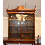 A George III mahogany and satinwood glazed bookcase, formerly the top from a secretaire bookcase,