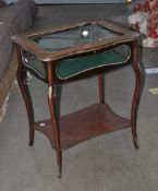 A mahogany and marquetry inlaid bijouterie table