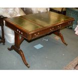 A stained wood library table in Regency style, of recent manufacture, with two short frieze