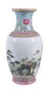 A Chinese Famille Rose vase, painted with a mountainous landscape and calligraphy, colourful