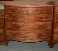 An early 19th century bow front chest of drawers, 104cm high, 103cm wide