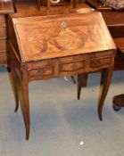 A Continental bureau de dames, with fitted interior included concealed well, 91cm high