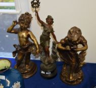 A pair of metal alloy models of children in 19th century taste, 20th century, 38cm high; and a