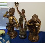 A pair of metal alloy models of children in 19th century taste, 20th century, 38cm high; and a