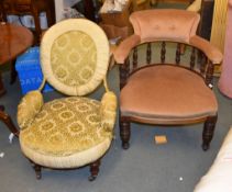 A Victorian mahogany and upholstered low armchair, and an Edwardian ÃŠptains' armchair (2)