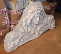 A moulded plaster pediment relief with central mask, 80cm x 150cm