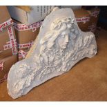 A moulded plaster pediment relief with central mask, 80cm x 150cm