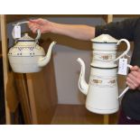 A large French enamelled metal coffee pot, early 20th century, with removable upper section and