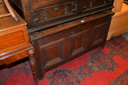 An oak mule, with geometric panel front above two short drawers, 66cm high, 124cm wide, 50cm deep