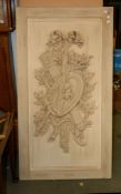 A cream painted wood relief moulded panel with a trophy emblematic of love, 167cm high, 87cm deep