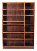 Ω A rosewood adjustable open bookcase, probably Danish, 1960s, 189cm high, 130.