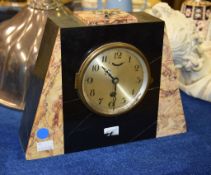 An Art Deco marble mantel timepiece, the dial and backplate each marked UCRA, 22cm high