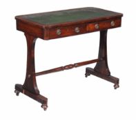 Ω A Regency rosewood side table, circa 1815, the rectangular top with rounded