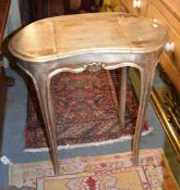 A silvered wood kidney shaped dressing table in Louis XV style, with compartment with mirrored