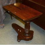 A William IV mahogany duet stand/reading table, circa 1835, the rectangular top with two opposing