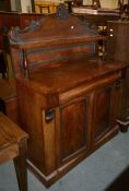 A Victorian chiffonier, with upstand above the cupboard base and with blind cushion drawer, 156cm