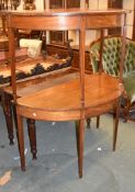 A pair of demi-lune mahogany side tables, and an additional leaf for use as a dining table, 76cm