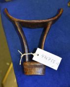 An African carved and stained wood Barshin headrest, (Somalia), probably 20th century, 19cm high