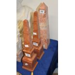 A pair of rouge marble obelisks, 20th century, on painted MDF bases, 39.5cm high overall; and a