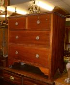 An Edwardian mahogany and inlaid washstand chest of drawers, with two short and two long drawers