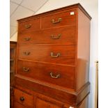 A mahogany chest of drawers, 19th century, two short and three long drawers each with gilt brass