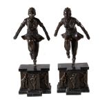 A pair of patinated metal figures of dancers, of recent manufacture, after the manner of Chiparus,