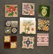 A box containing a quantity of various tiles, printed and Majolica type, including Minton & Maw