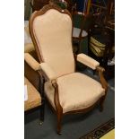 A French carved walnut armchair, with pink upholstery