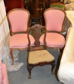 A pair of French carved walnut side chairs, 19th century, and a child's oak chair (3)