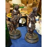 After Mathurin Moreau (1822-1912), a pair of patinated metal models of maidens in the Classical