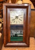 An American walnut veneered wall clock, the 30 hour movement by Jerome & Co. New Haven Conneticut,