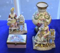 A pair of German porcelain models of the Senses, after Meissen originals; a French porcelain pink-