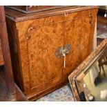 A walnut drinks cabinet in George I style, with label to rear for George Strachan & Son Ltd, 122cm