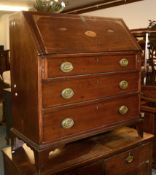 A George III mahogany bureau, late 18th/early 19th century, the fall enclosing a fitted interior and