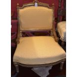 A Louis XVI style carved and giltwood chair, late 19th century, with upholstered seat and back