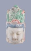 A Chinese painted marble head, 28cm high