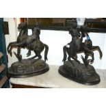 A pair of Continental spelter equestrian groups, early 20th century, 38cm high