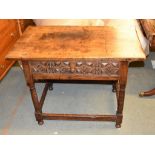 A Continental walnut side table, the drawer with geometric designs, 74cm high, 102cm wide, 60cm deep