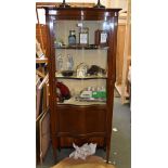 An Edwardian mahogany and line inlaid display cabinet, of serpentine outline, 173cm high, 69cm deep