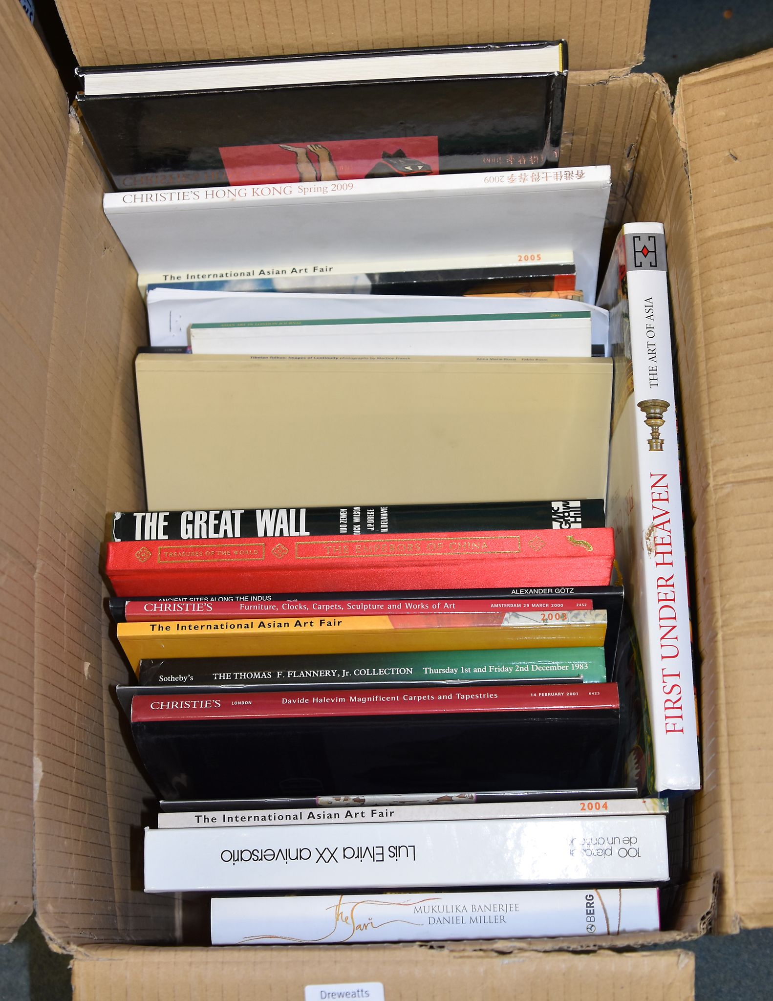 A box containing a quantity of Chinese auction catalogues and Chinese interest books
