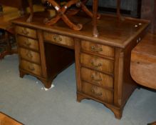 A mahogany desk in George III style, 74cm high, 127cm wide