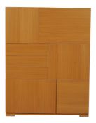A walnut Check storage cabinet by Heal & Son, circa 2006, 150cm high, 115cmwide, 45cm deep Purchased