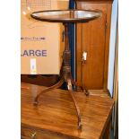 A mahogany tripod table in George III style , with label for GREENLANDS Ltd HEREFORD, 63cm high,