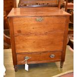 A mahogany enclosed Canterbury, with twin hinged covers to the top, above a frieze drawer, 54cm high