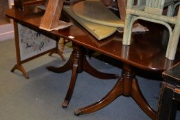 A modern mahogany twin pedestal dining table, with single additional leaf, approx. 210cm long