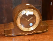 A walnut cased mantel clock, circa 1930, with German HAC movement with later silvered platform lever