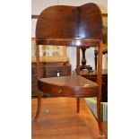 A George III mahogany corner washstand, 112cm high