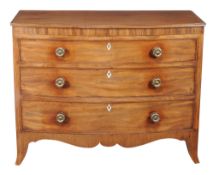 Ω A Regency mahogany and line inlaid chest of drawers, circa 1815, of bow front