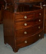 A George III mahogany bowfront chest of drawers, with two short and three long graduated drawers,